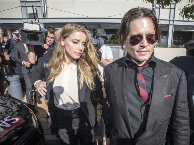 Johnny Depp and Amber Heard leave The Southport Court after she plead guilty to providing a false document. Picture: AAP Image/Glenn Hunt