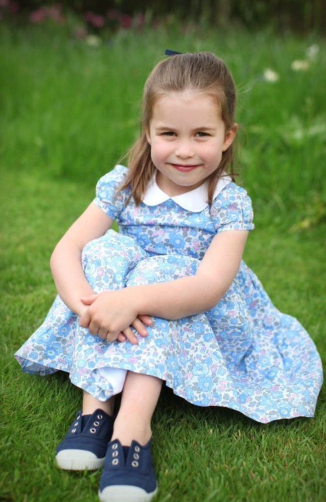 Charlotte’s floral dresses are definitely her signature look. Seen here on her fourth birthday. Picture: Twitter