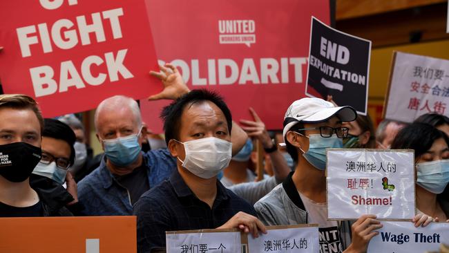 A large crowd rallies on Moonta Street, Chinatown outside Fun Tea to protest wage theft. Picture: Tricia Watkinson