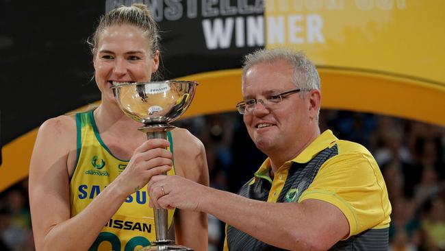 Prime Minister Scott Morrison presents the Constellation Cup to Caitlin Bassett. Picture: Richard Wainwright