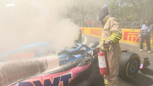 Pierre Gasly’s car has to be extinguished during practice. Picture: F1.