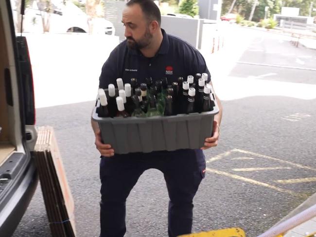 Liquor being moved from the restaurant. Picture: Supplied