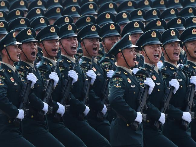 Chinese troops march in Tiananmen Square in Beijing. Picture: AFP