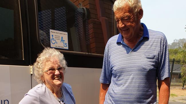 VOLUNTEERS NEEDED: Whiddon Maclean resident Lola Eggins with volunteer Peter Munro, who drives the Whiddon bus and helps with outings.