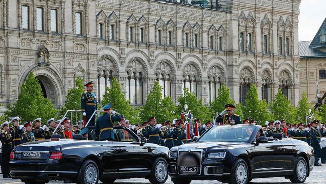 Defence Minister Sergei Shoigu salutes to soldiers. Picture: Gavriil Grigorov/Sputnik/AFP