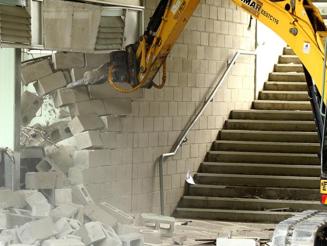 An excavator demolishing the stadium. Picture: Justin Sanson