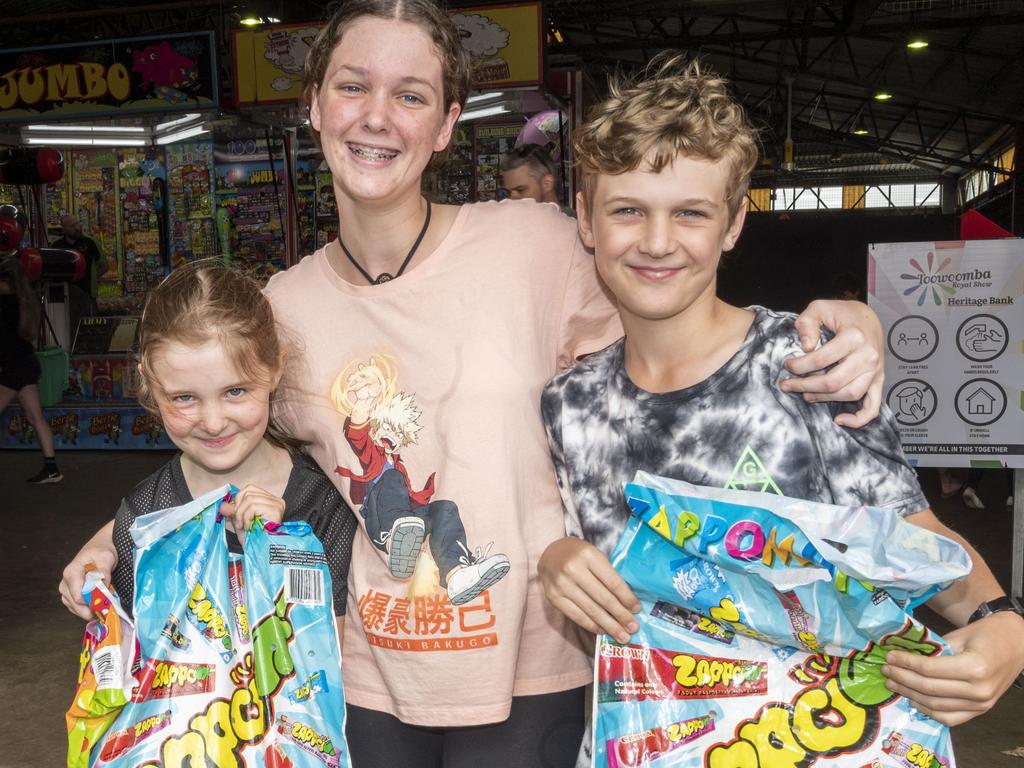 Charlotte, Hannah and Samuel Canning on day 3 of the Toowoomba Royal Show. Sunday, March 27, 2022. Picture: Nev Madsen.