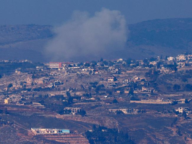 Smoke billowing above the Lebanese village of Khiam during Israeli bombardment, on December 2, 2024, days into a fragile ceasefire between it and the Iran-backed Islamist group. Picture: AFP