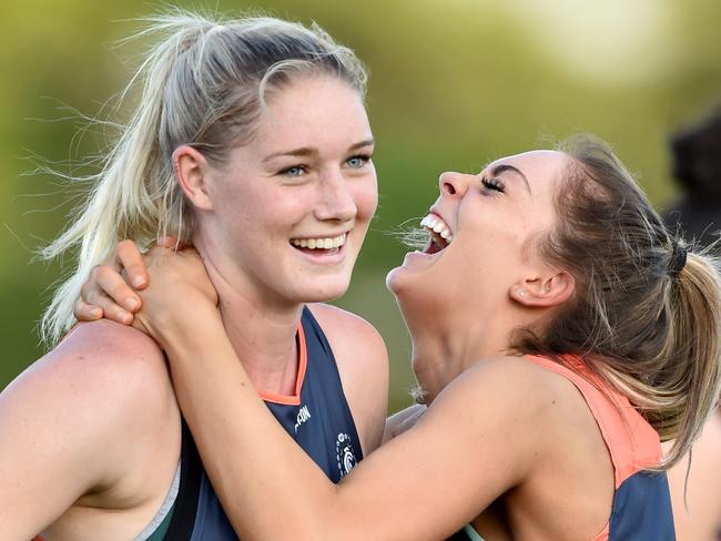 Carlton AFLW football training. Tayla Harris and Bridie Kennedy do a piggy back drill.Picture: Jay Town