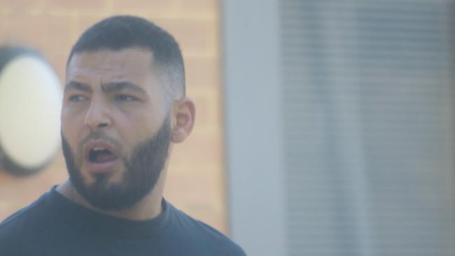 Madyn 'Mick' Kassem, 29, of Granville, leaving Wyong Local Court where he pleaded guilty to intimidation, aggravated enter dwelling and demanding property with menaces after he tried to evict a guest at The Entrance Motel. Picture: NewsLocal