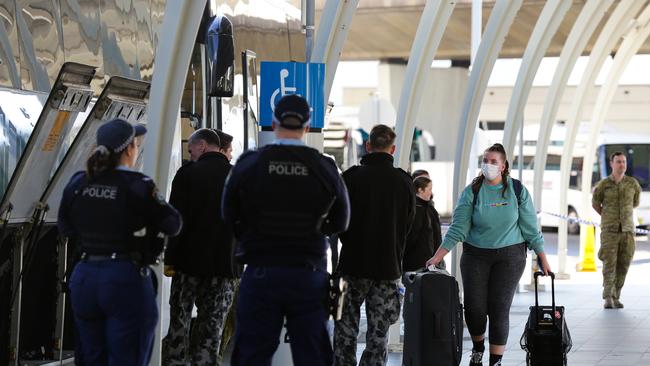 Returning passengers arrive at Sydney International Airport. Picture: Gaye Gerard