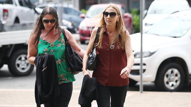 Rachel Penno (right), mother of missing man Jayden Penno-Tompsett, enters the Cairns Courthouse flanked by family supporters on the first day of the inquest into his disappearance. Picture: Brendan Radke