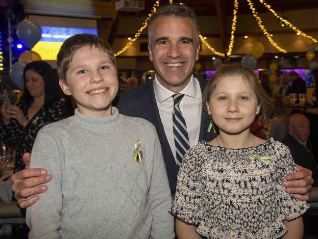 Premier Peter Malinauskas with Anastasia, 8, and Max, 10, Lada. Picture: Naomi Jellicoe