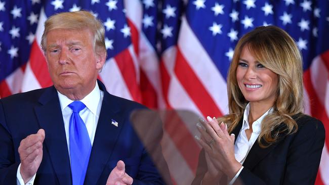 US President Donald Trump claps alongside US First Lady Melania Trump after speaking during election night. Picture: Mandel Ngan/AFP.