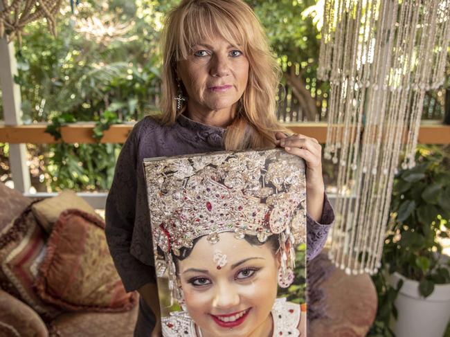 12th June 2018. Sonia Anderson holding an image of her daughter Bianca Girven, who was murdered by her partner 9 years ago. Controversy over a new book by forensic psychiatrist Donald Grant on 10 Queensland killers he assessed. Sonia Anderson is distraught after finding out her daughter Bianca Girven's last words in the book. Bianca was murdered by her on-again off-again boyfriend Rhys Austin in Mt Gravatt in 2010.Photo: Glenn Hunt / The Australian