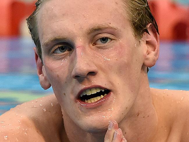 Mack Horton looks on after winning the Mens 1500m Freestyle Final on day 8 of the Australian Swimming Championships at the SA Aquatic and Leisure Centre in Adelaide, Thursday, April 14, 2016. (AAP Image/Dave Hunt) NO ARCHIVING, EDITORIAL USE ONLY