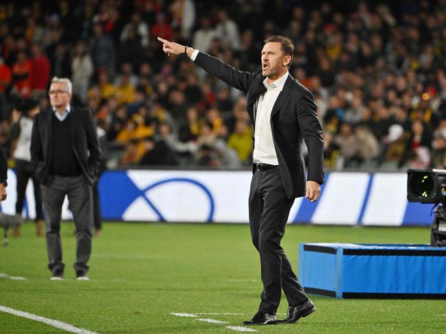 Australia's coach Tony Popovic gestures during the Socceroos’ 3-1 win. Picture: AFP