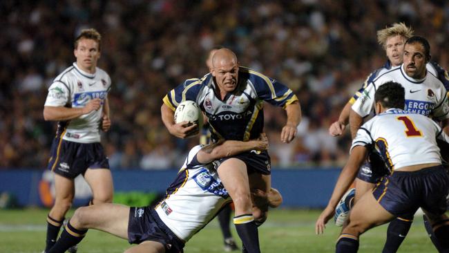 Leigh McWilliams gets tackled by David Stagg.