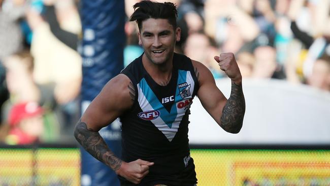 Chad Wingard of the Power celebrates a goal against West Coast.