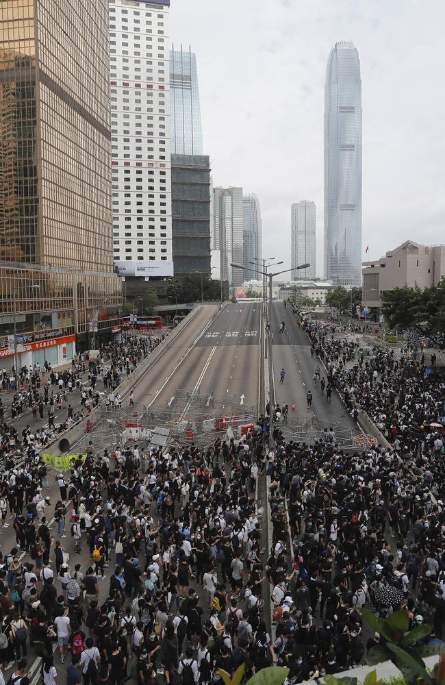 Protesters gather near the Legislative Council. Picture: Kin Cheung/AP