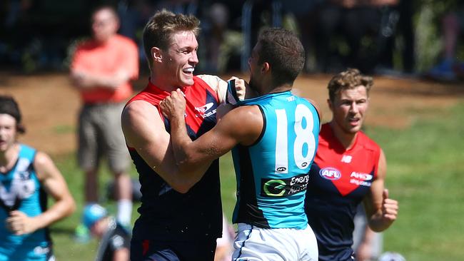 Former teammates Tom McDonald and Jimmy Toumpas came to blows. Picture: Sarah Reed