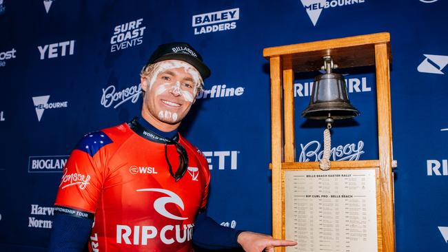 North Stradbroke Island Minjerribah’s Ethan Ewing points to his mum’s name on the Bells Beach trophy. Ewing won the prestigious Rip Curl Pro Bells Beach classic 40 years after his late mum. Picture: Beatriz Ryder/World Surf League