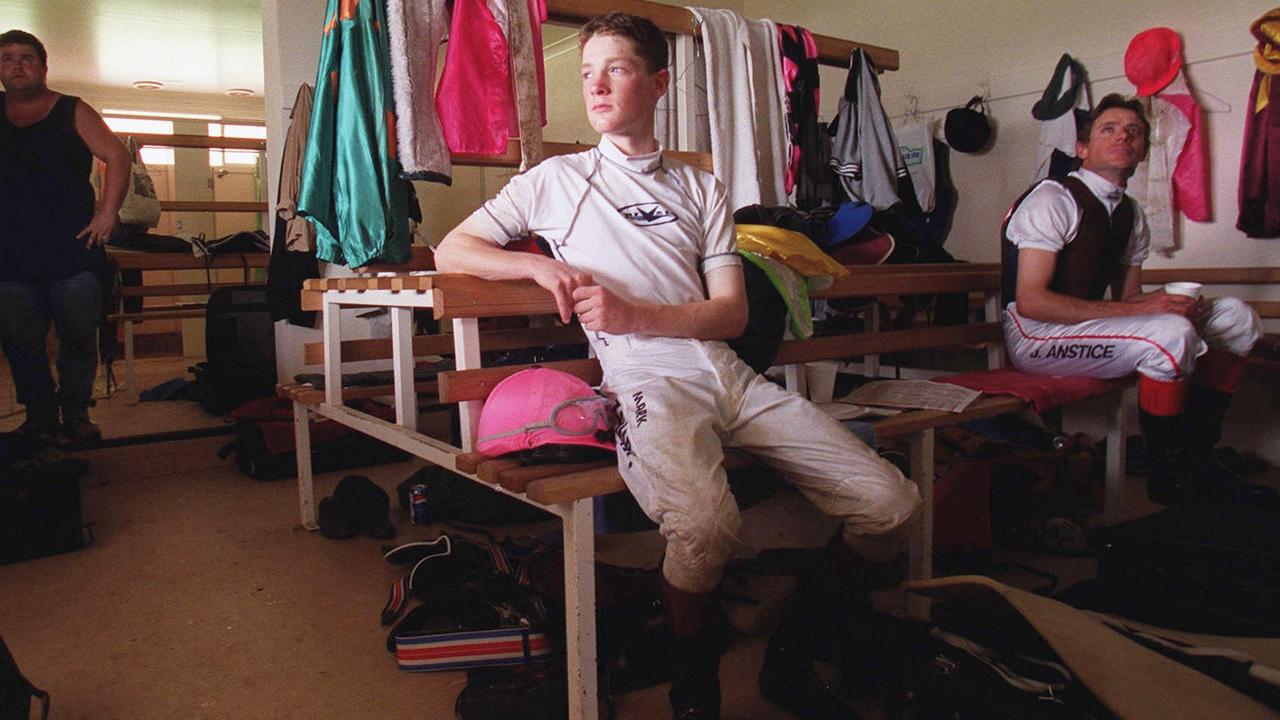 3/2/2001. Aspiring jockey Mark Zahra sees the light and takes time out during the running of the 7th at the Wodonga races.