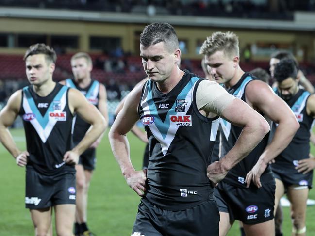 Tom Rockliff and Ollie Wines during the 2018 season. Picture SARAH REED