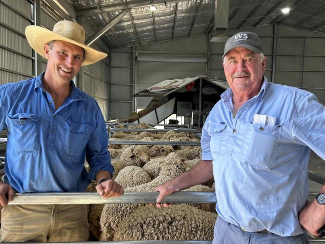 Jim Meckliff and Andrew Calvert attend the shearing of the wethers during the Merino trial at Temora. Picture: Supplied