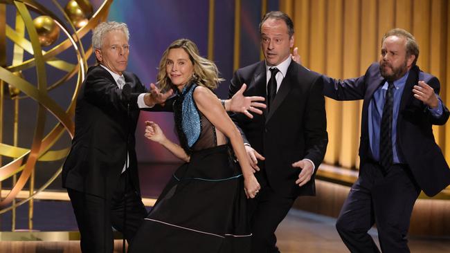 Ally McBeal stars Greg Germann, Calista Flockhart, Gil Bellows and Peter MacNicol dance onstage. Picture: Getty Images via AFP