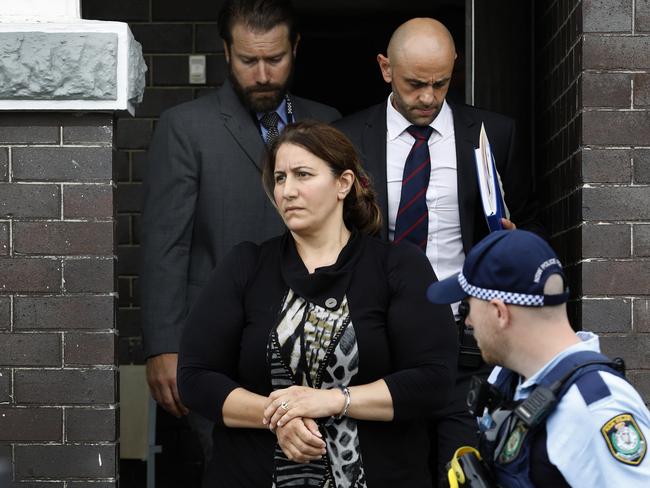 Mother Gladiss Mahfouz, then 53, is arrested at her Bankstown family home on March 22, 2019.