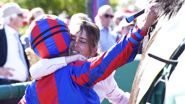 Walker and Tash Eaton embrace after Prince Of Arran’s victory. Pic: Alan Barber