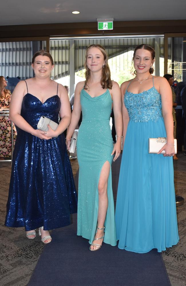 Sophie Mills, Tamsin Roberts and Emily Swan at the Sunshine Coast Grammar School formal 2023. Photo: Jorina Maureschat