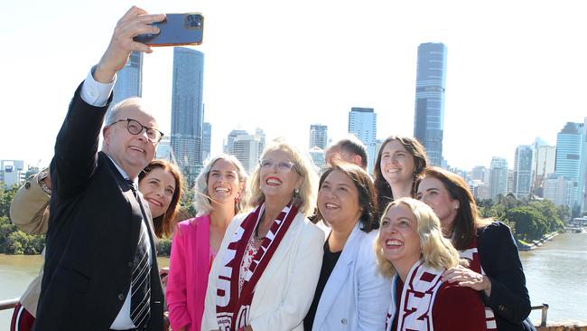 Prime Minister Anthony Albanese takes a selfie with Queensland Labor MPs in Brisbane on Thursday. Picture: Richard Gosling/NCA NewsWire