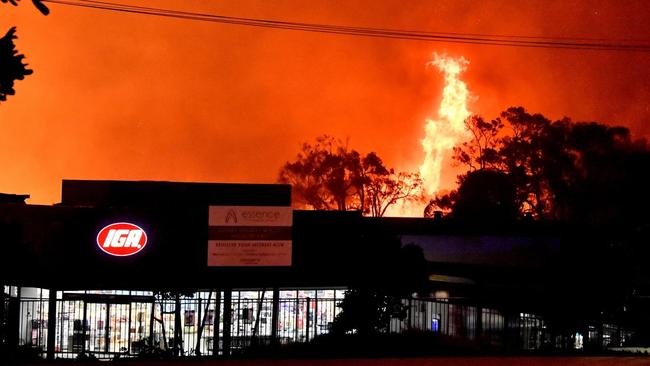 A fire burns neat Peregian Beach IGA on Monday night. Photo: John McCutcheon / Sunshine Coast Daily