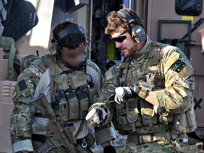 SAS Corporal Ben Roberts-Smith VC., MG., with the Australian Special Operations Task Group prepares to deploy to the Shah Wali Kot Offensive, Afghanistan, in June 2010. DEPT. OF DEFENCE IMAGE.