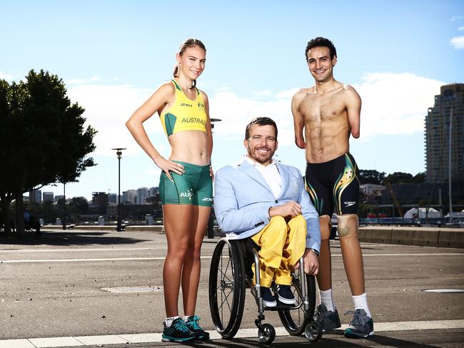 Torita Isaac, Kurt Fearnley and Ahmed Kelly show off the new Aussie designs.