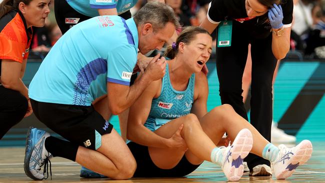 SYDNEY, AUSTRALIA - MARCH 24: Lauren Moore of the Mavericks receives treatment for an injury during the 2024 Suncorp Team Girls Cup match between the Giants and the Mavericks at Ken Rosewall Arena on March 24, 2024 in Sydney, Australia. (Photo by Mark Metcalfe/Getty Images for Netball Australia)