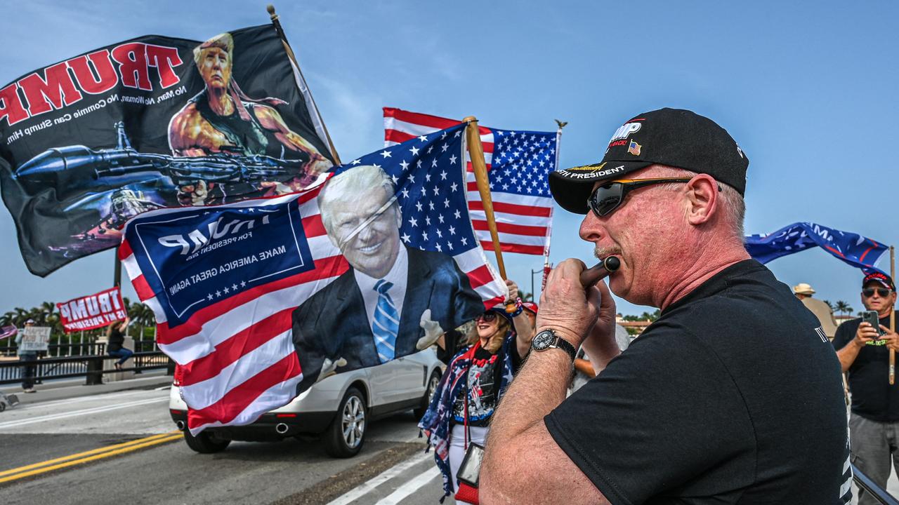 Trump’s supporters gather outside his Palm Beach home. Picture: AFP