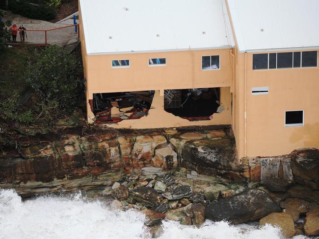 An overhead shot shows the extent of the damage to the surf club. Picture: Toby Zerna