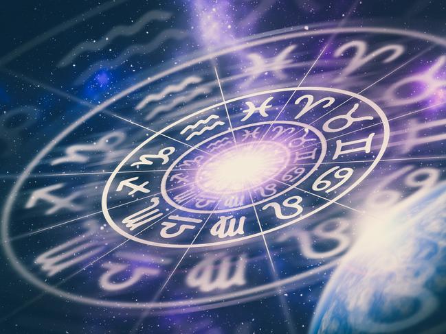 Astrological zodiac signs inside of horoscope circle on universe background - astrology and horoscopes concept