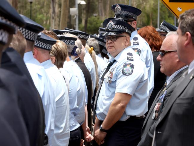 Mourners at the memorial service with full police honours for fallen constables Rachel McCrow and Matthew Arnold at Brisbane Entertainment Centre. Picture: Steve Pohlner