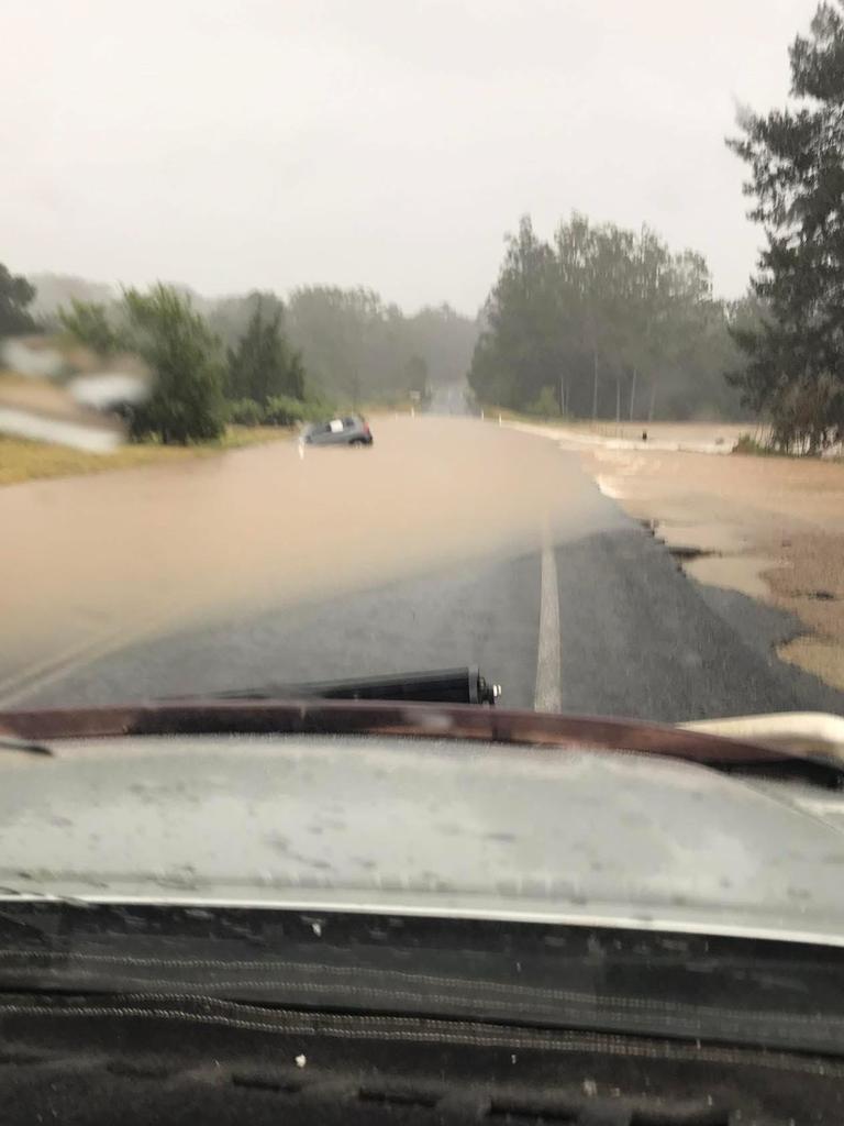 Flooding at Bo Bo Creek on the Bucketts Way about 8.30am on Tuesday. Photo by Tammy Amos McMillan who said she stopped to check the car and there was nobody inside.