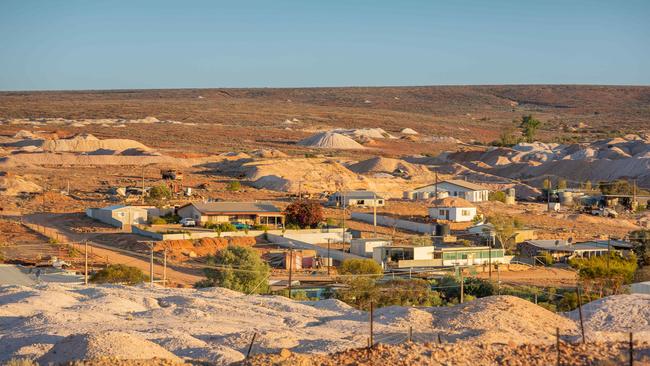 Houses in Andamooka, with opal mine fields in the background. Picture: Ben Clark