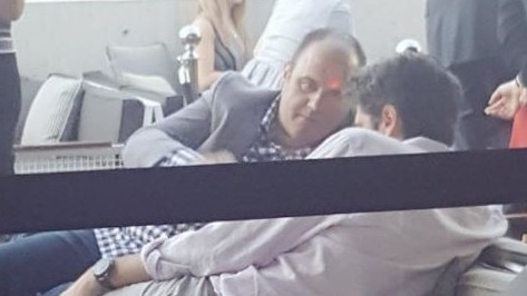 Crocmedia boss Craig Hutchison and AFL chief Gillon McLachlan in discussions at Southbank bar QT in December 2016. Picture: Instagram