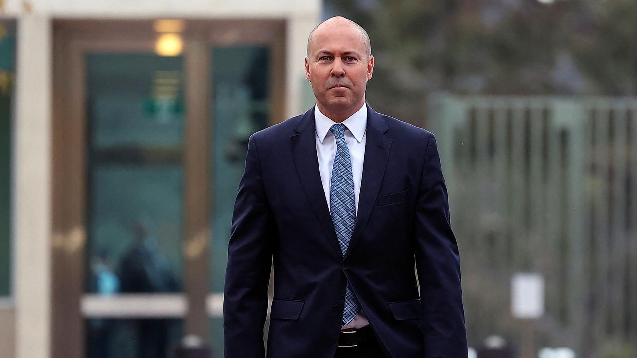 Australia's Treasurer Josh Frydenberg arrives to speak to the media outside Parliament House in Canberra on March 29, 2022, ahead of his federal budget speech for the year 2022/23. (Photo by AFP)