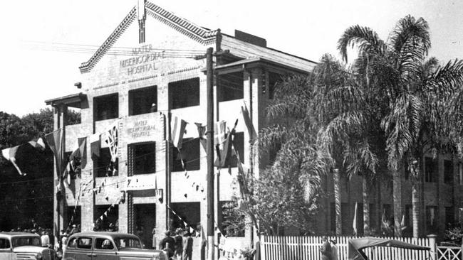 NEW HOSPITAL: Flags and bunting adorn the Gordon Street entrance of the Mater Hospital during its official opening in August 1936. Sydney Street Markets now stands on the site. Picture: Daily Mercury Archives