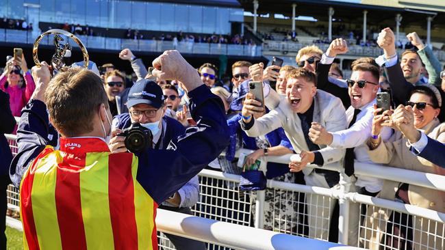 James McDonald shows off his Everest trophy with the Randwick crowd. Picture: Getty Images