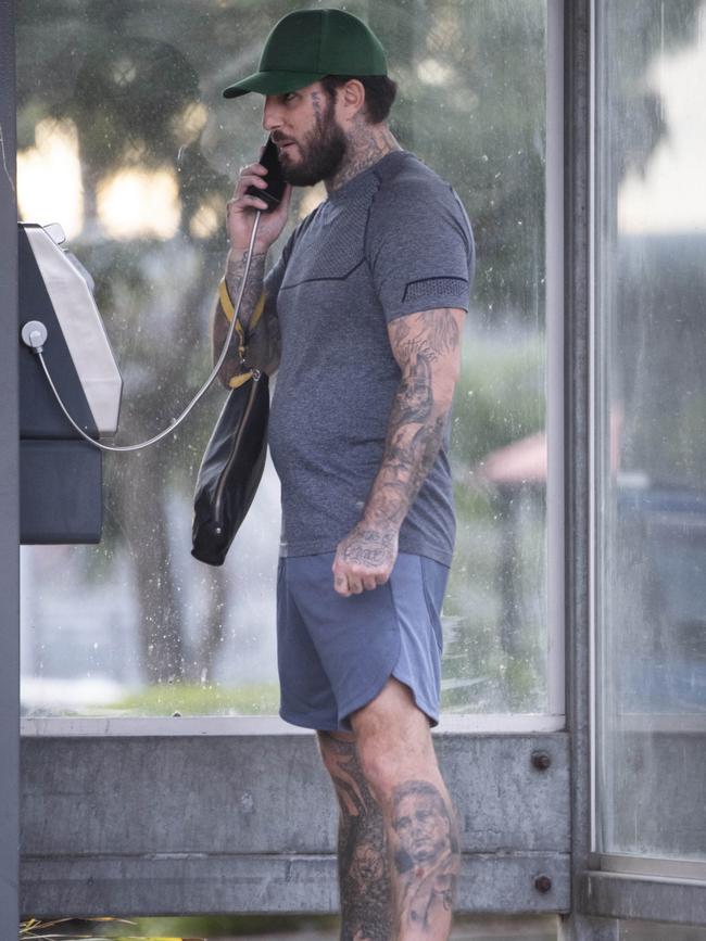 Ex-Comanchero boss Allan Meehan makes a call outside jail. Picture: Monique Harmer