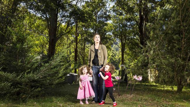 Bronwyn Page with twins Poppy and Daisy. Photo: Daniel Pockett